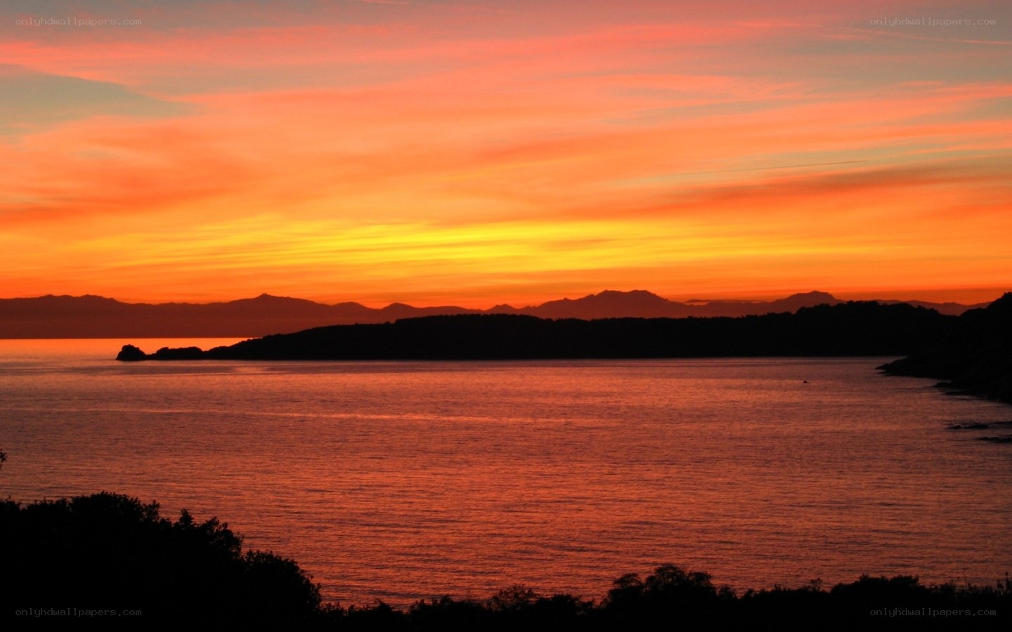 sunset over coastal waters