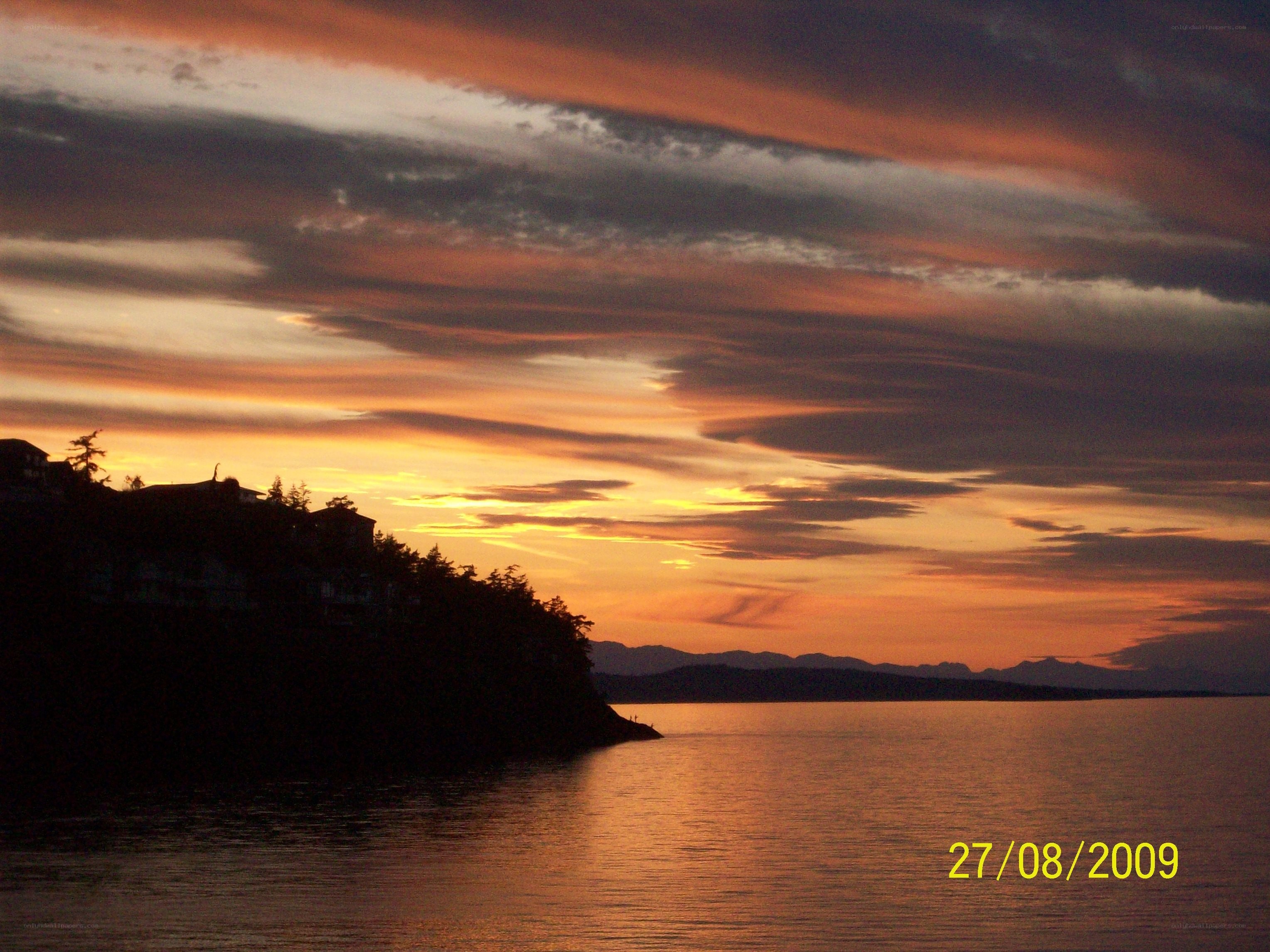 sunset over coastal waters