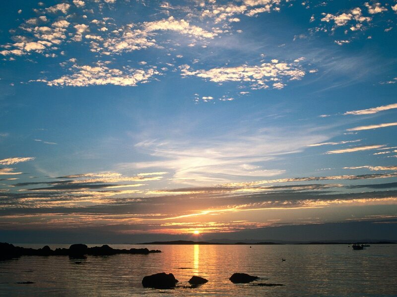 Sunset over coastal waters