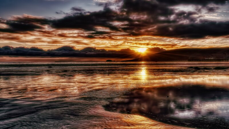 Sunset over Coastal Waters — Orange, Dramatic
