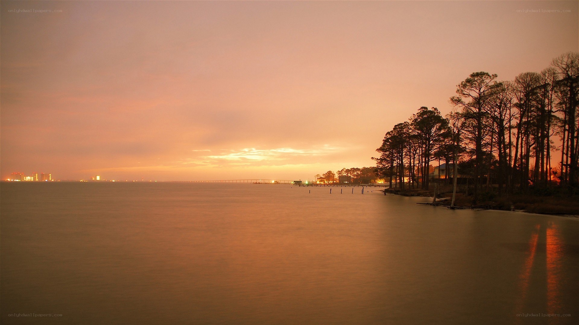 sunset over coastal waterway