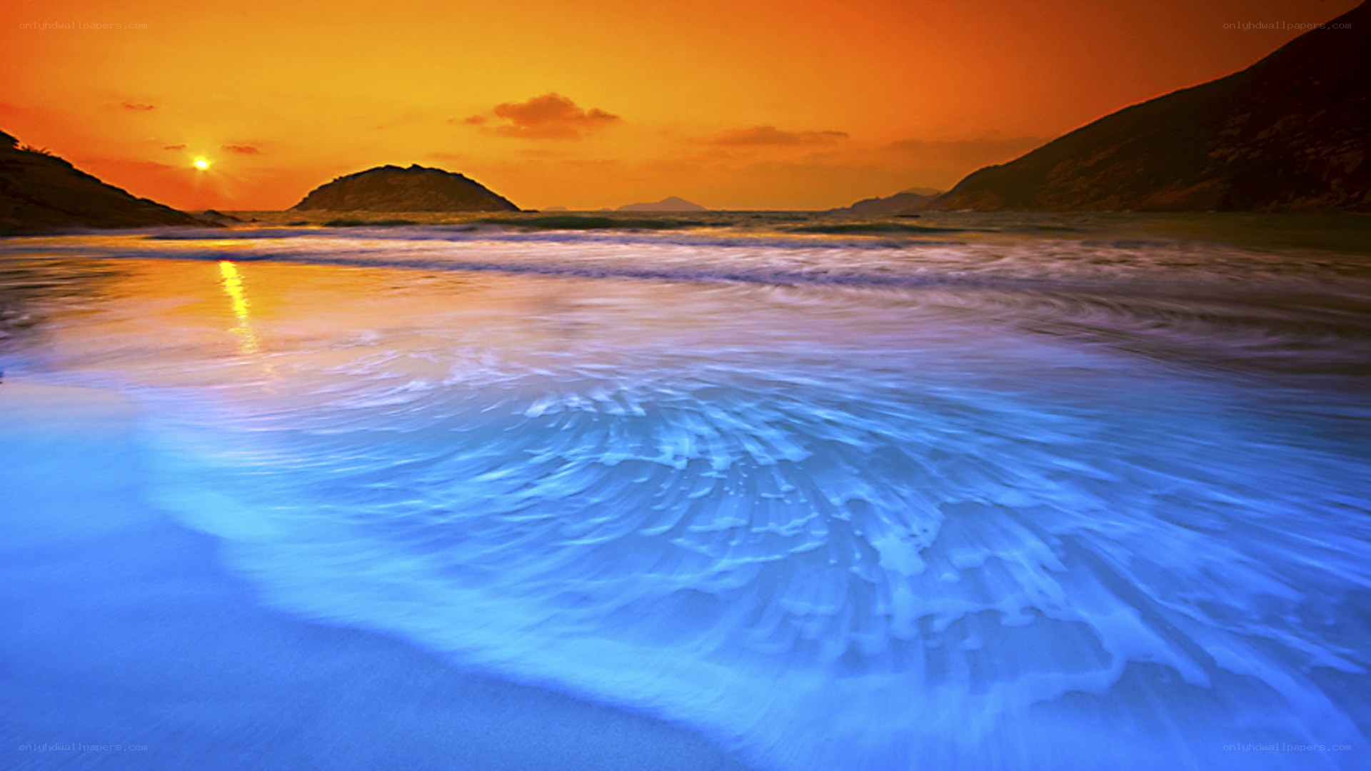 Sunset over coastal waves