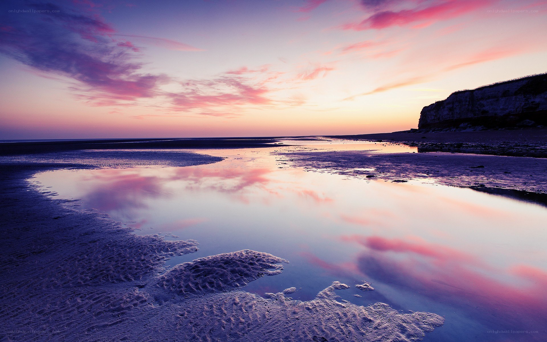 Sunset over coastal wetlands