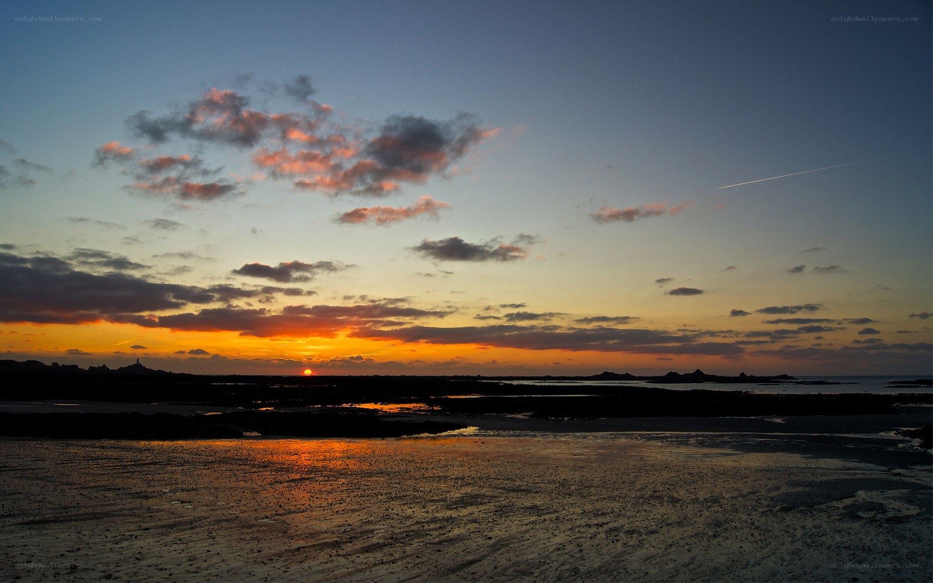 sunset over coastal wetlands