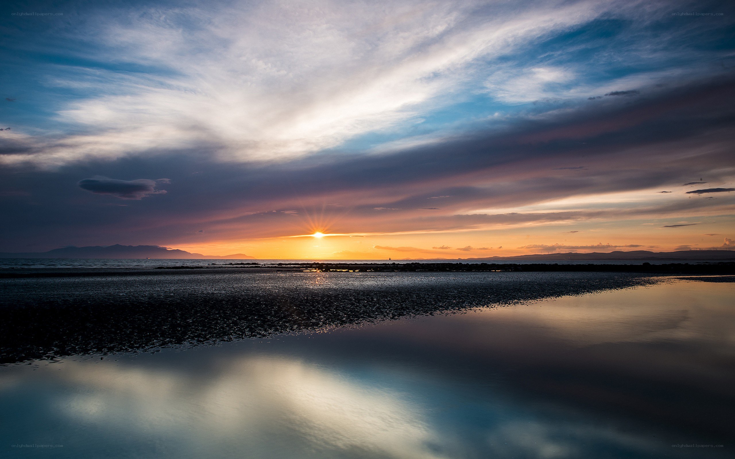 Sunset over coastal wetlands