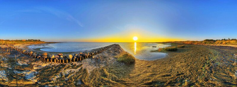 Sunset over coastal wetlands