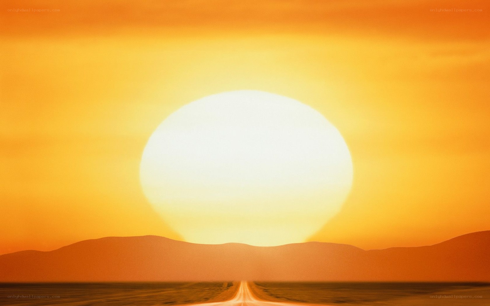 Sunset over desert highway
