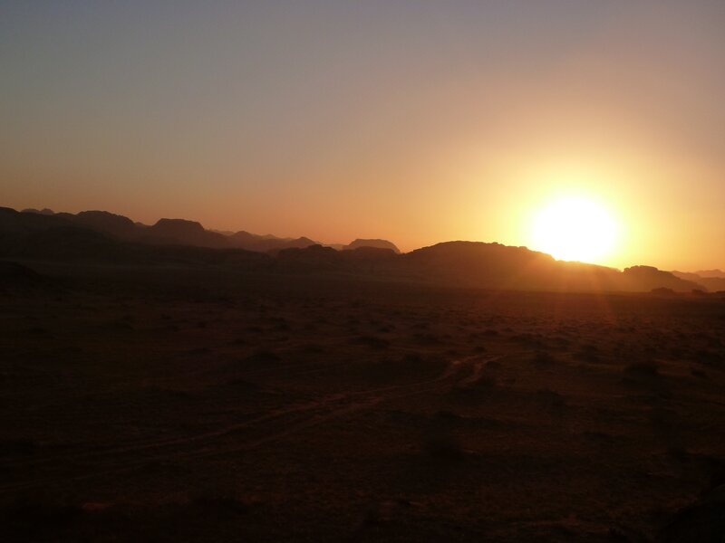 Sunset over desert mountains
