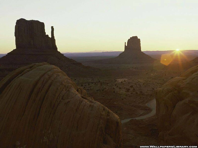 Sunset over desert rock formations