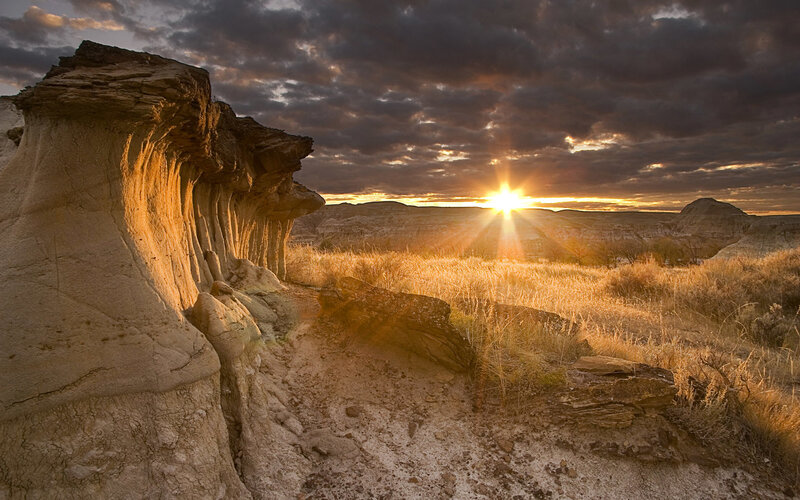 Sunset over desert rock formations