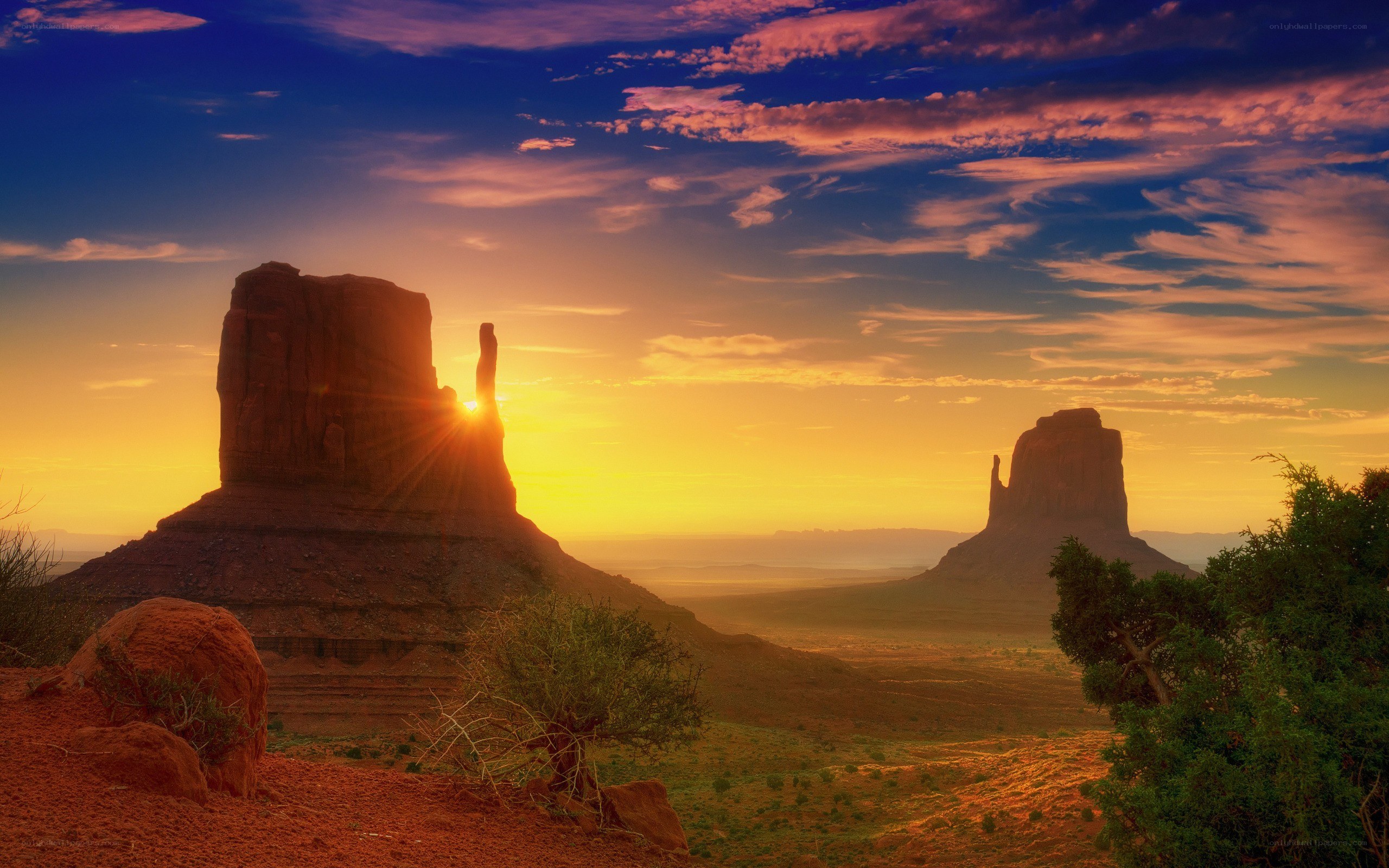 Sunset over desert rock formations