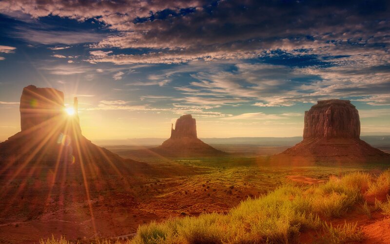 Sunset over desert rock formations