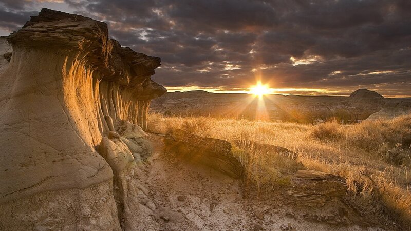 Sunset over desert rock formations
