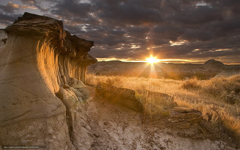 Sunset over desert rock formations