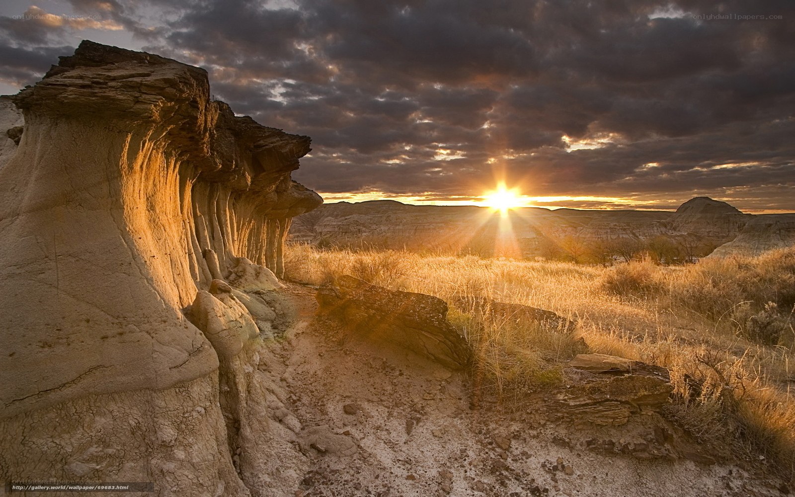 Sunset over desert rock formations