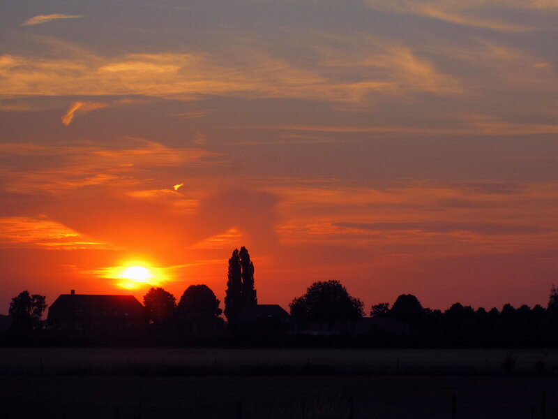 Sunset over Farm Buildings