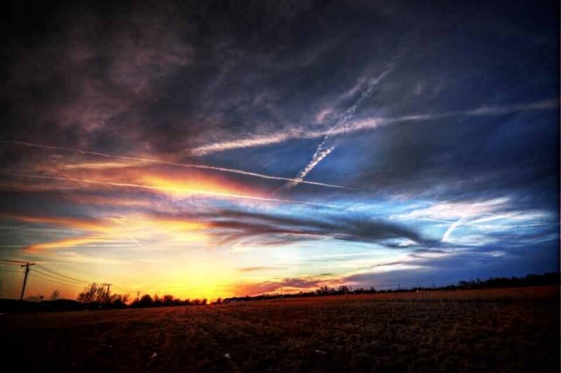 Sunset over Field — Orange, Dramatic, Photograph, Clouds