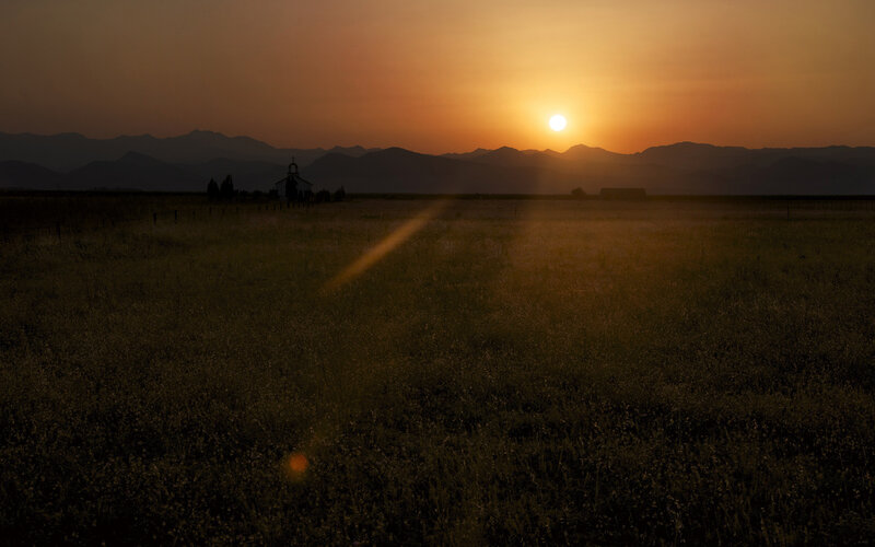 Sunset over Field — Orange, Serene, Photograph, Mountains