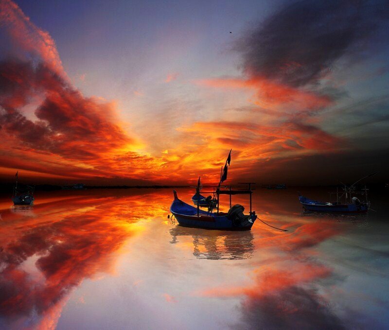 Sunset over fishing boats