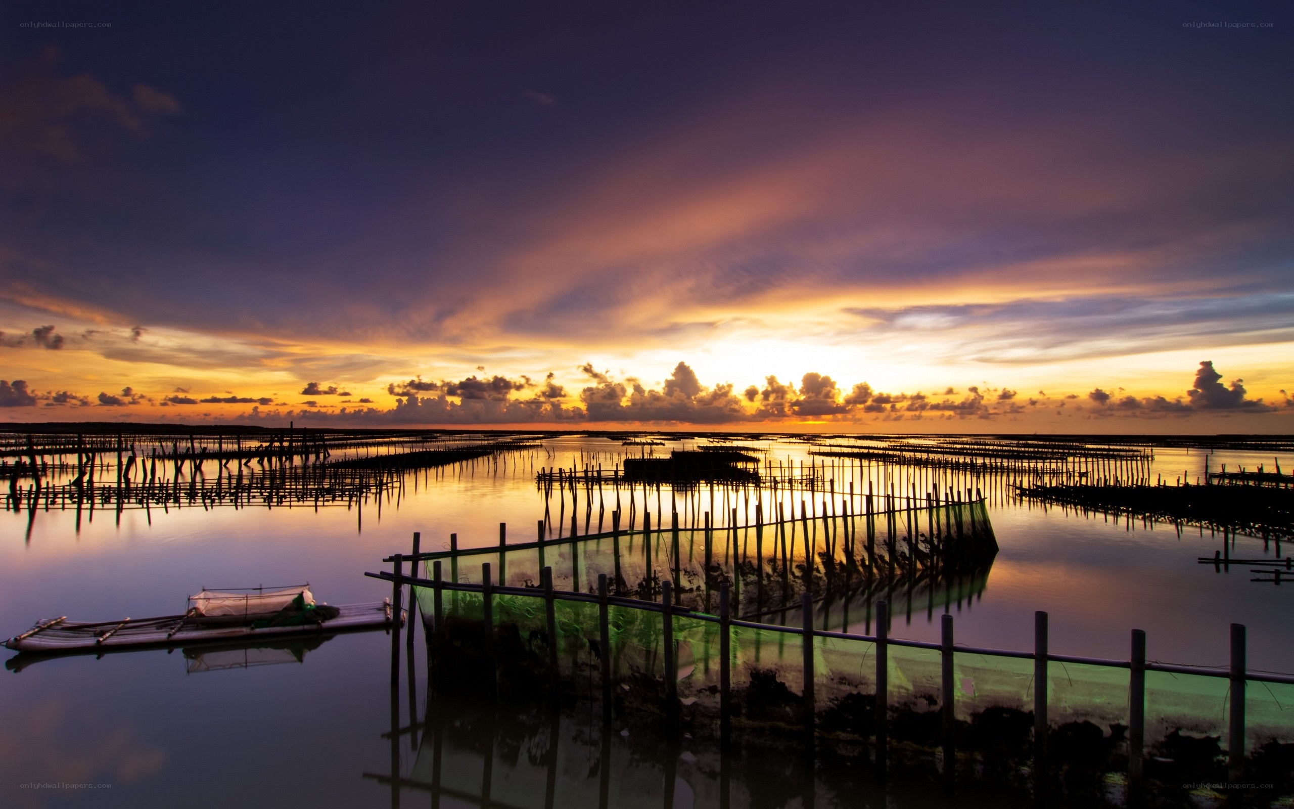 Sunset over fishing farm
