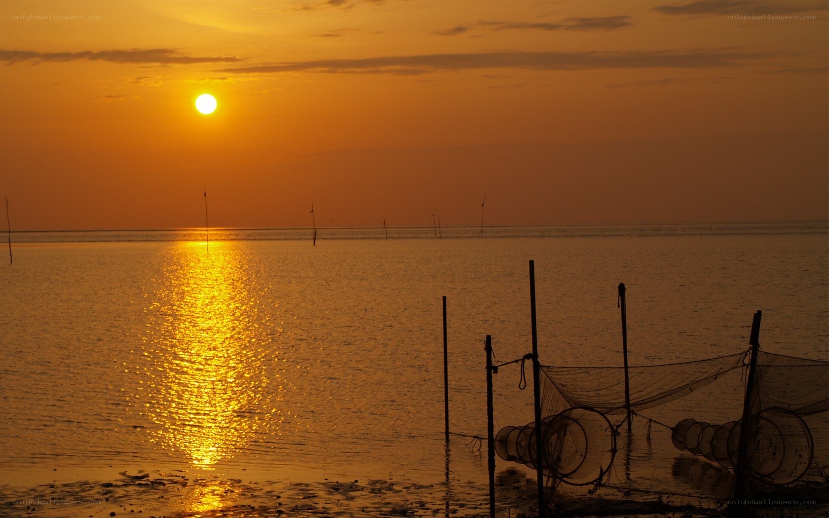 Sunset over fishing nets