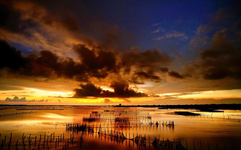 Sunset over fishing nets
