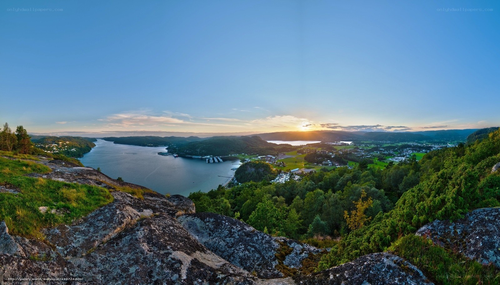sunset over fjord landscape