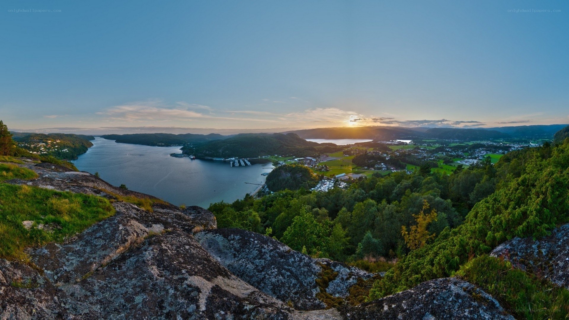 Sunset over fjord landscape