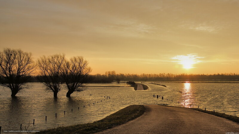 Sunset over flooded landscape