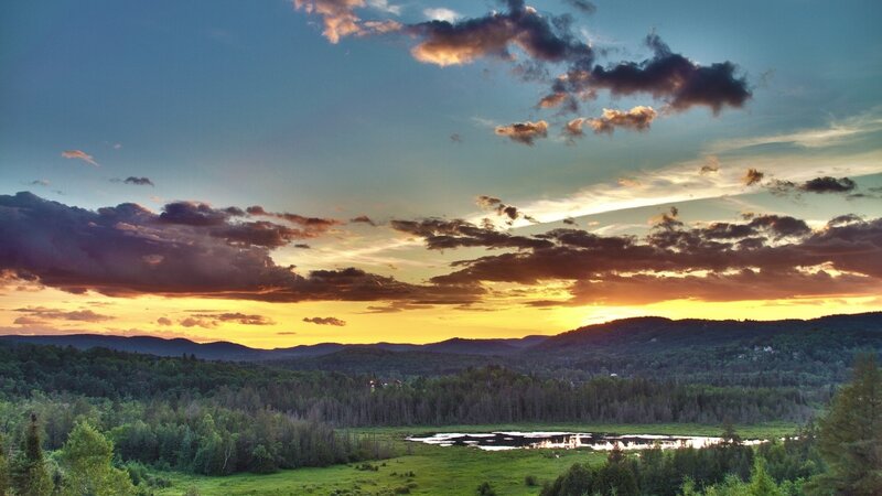 Sunset over Forested Hills — Blue, Serene, Photograph, Clouds