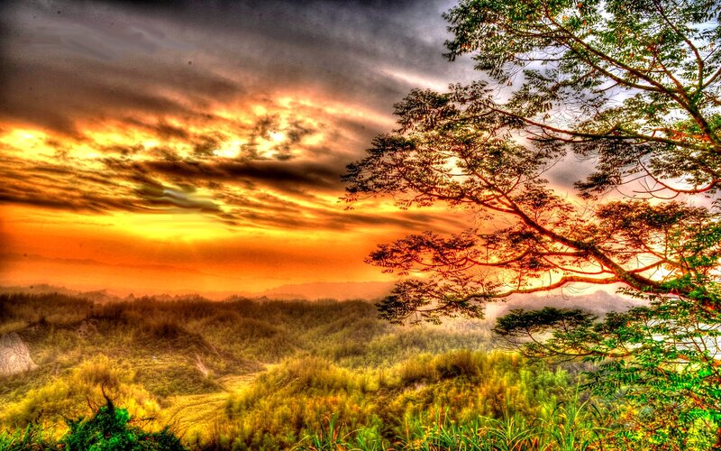 Sunset over Forested Hills — Orange, Dramatic, Photograph