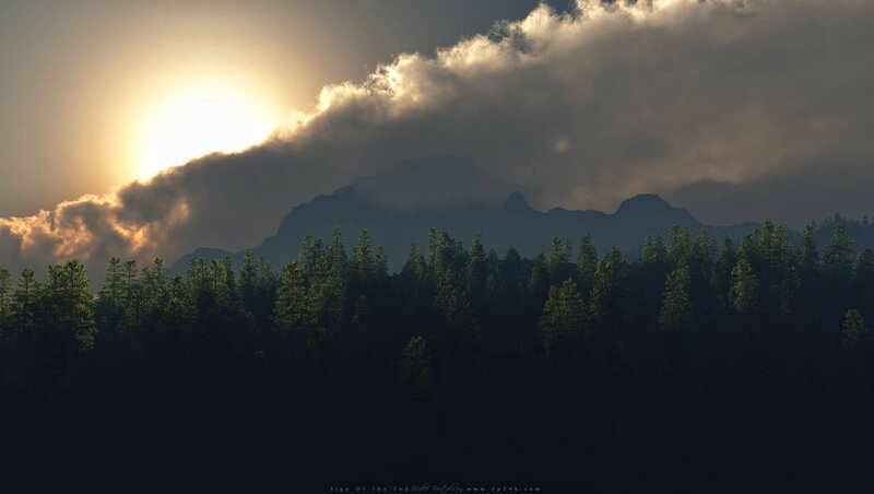 Sunset over forested mountains