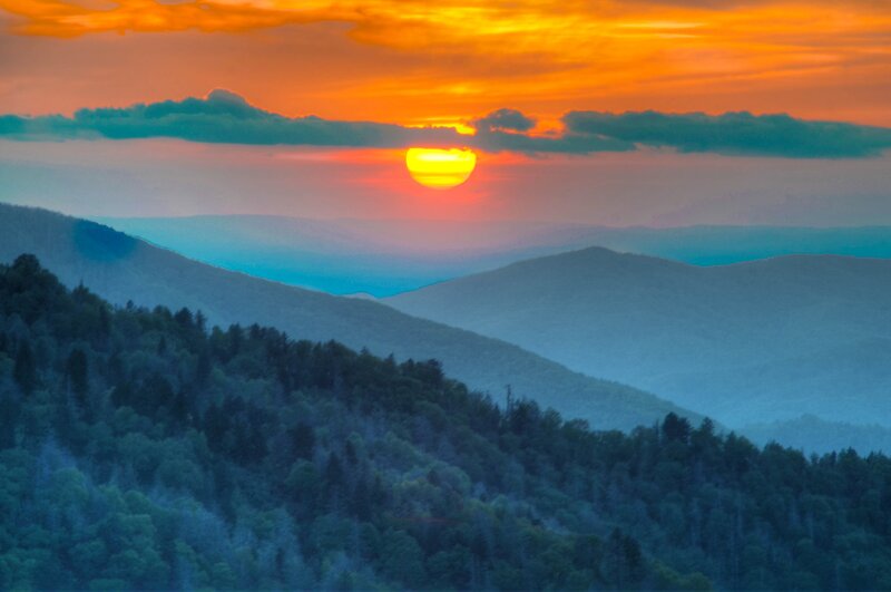 Sunset over Forested Mountains — Orange, Serene
