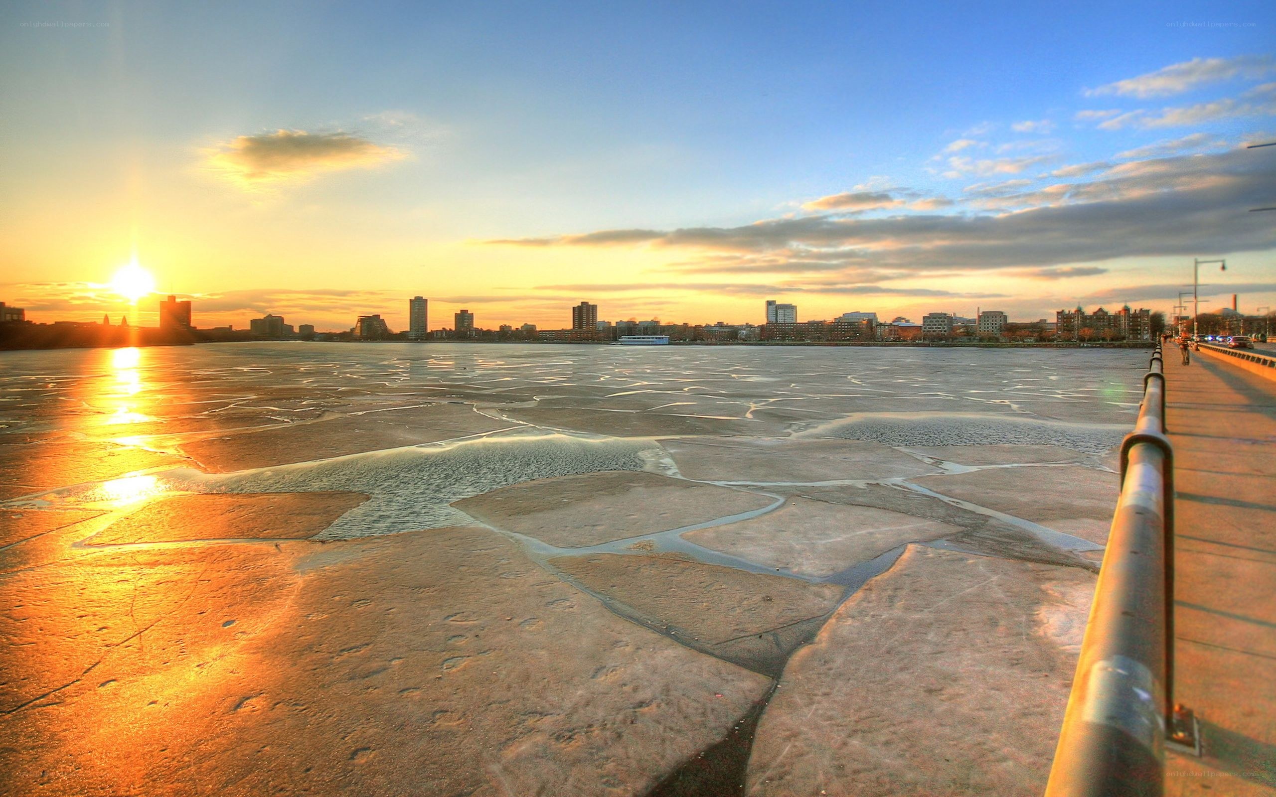 Sunset over frozen river