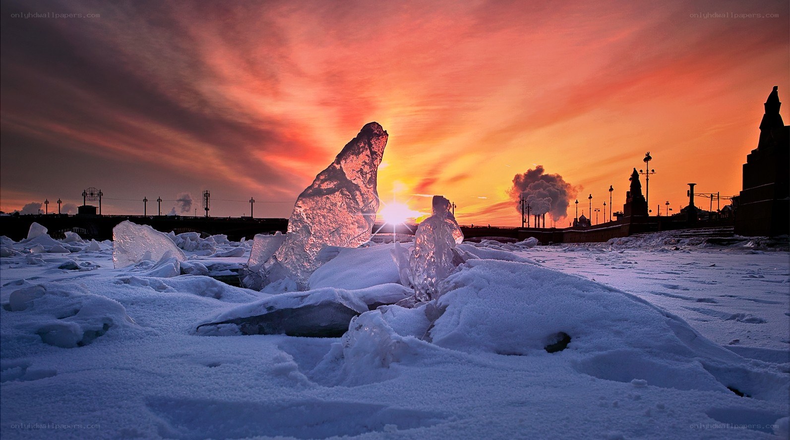 Sunset over frozen river ice