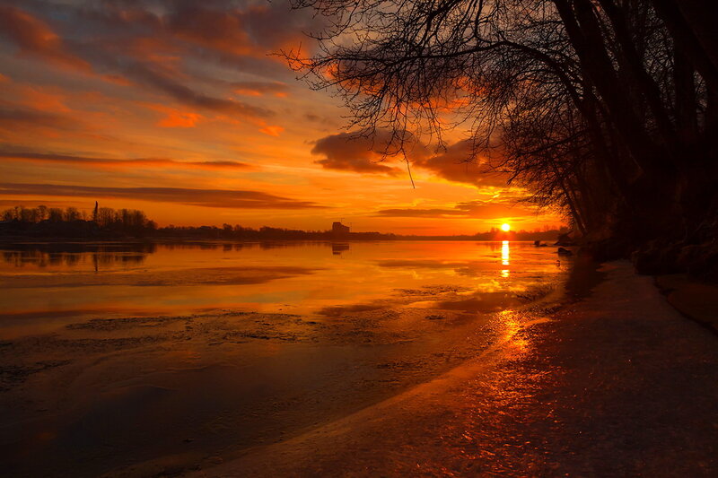 Sunset over Frozen River — Orange, Dramatic