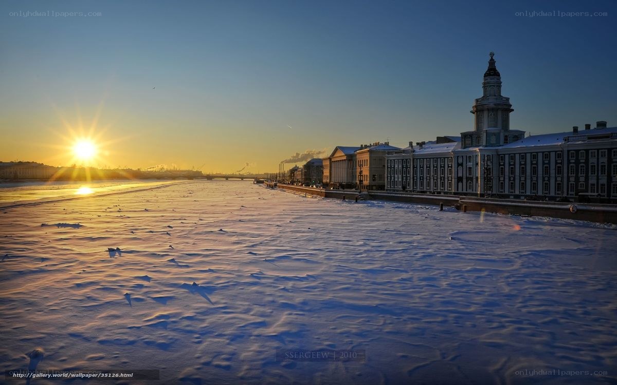 Sunset over frozen river