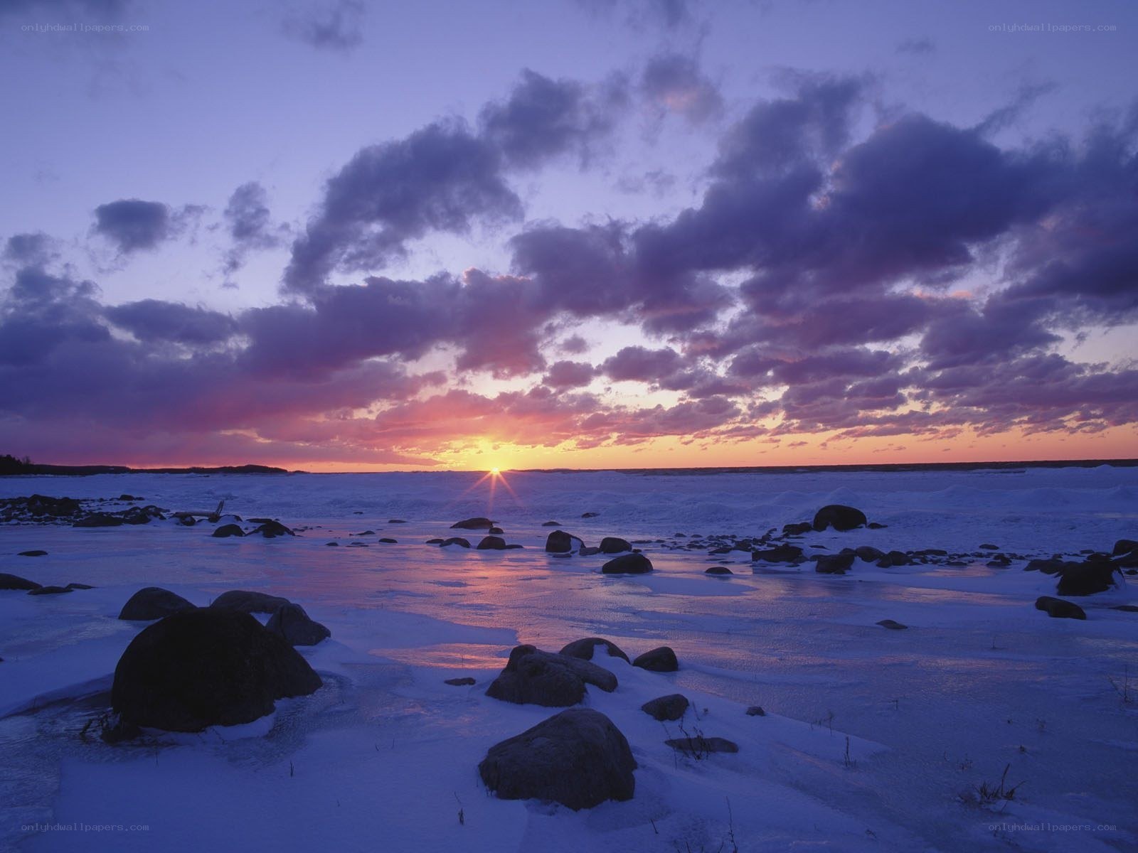 Sunset over frozen sea