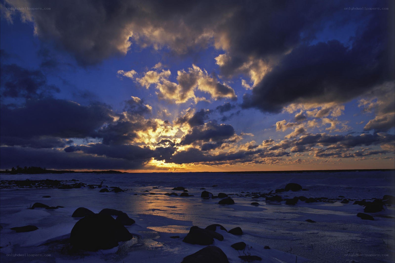 Sunset over frozen sea