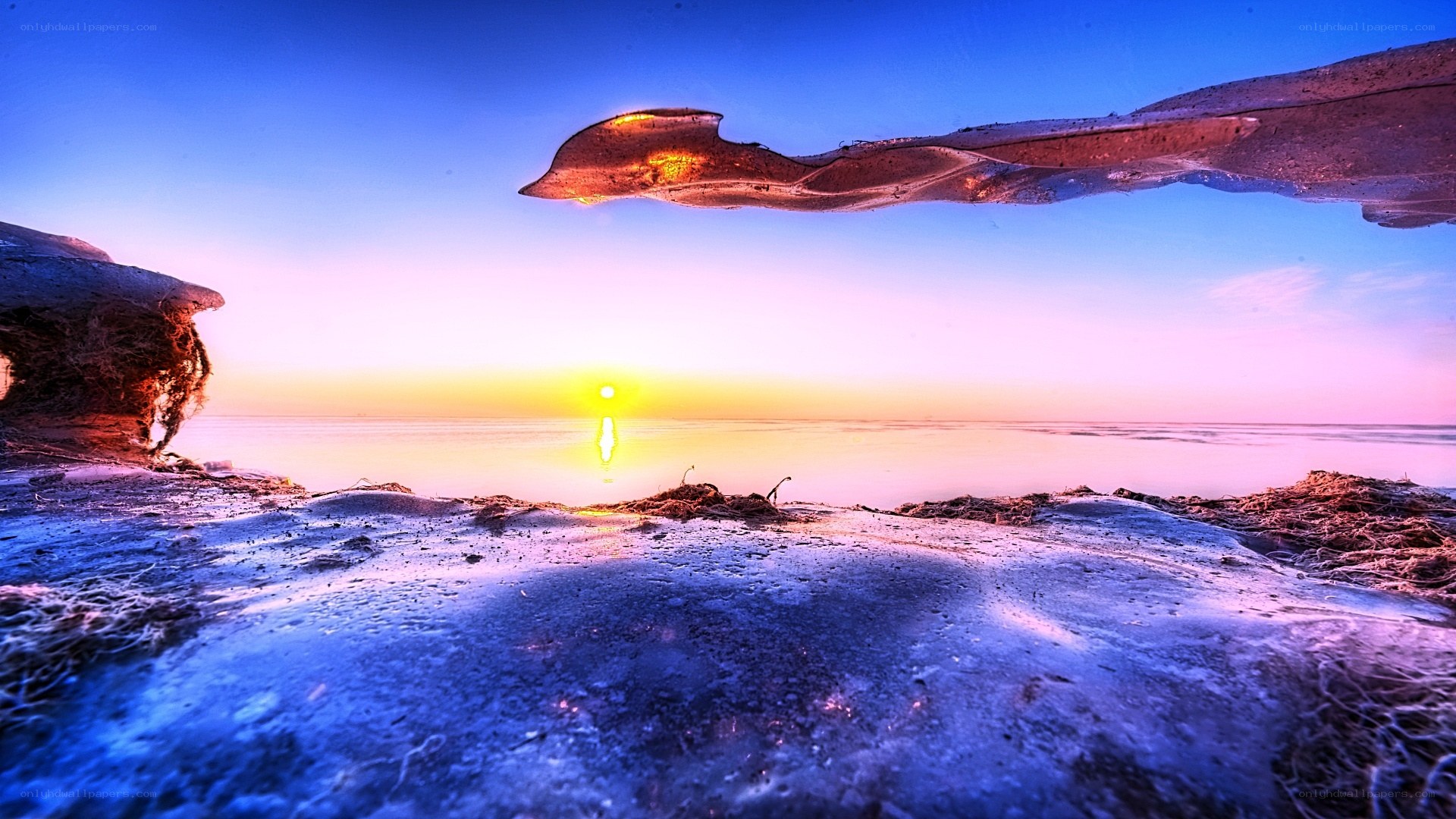 Sunset over frozen sea