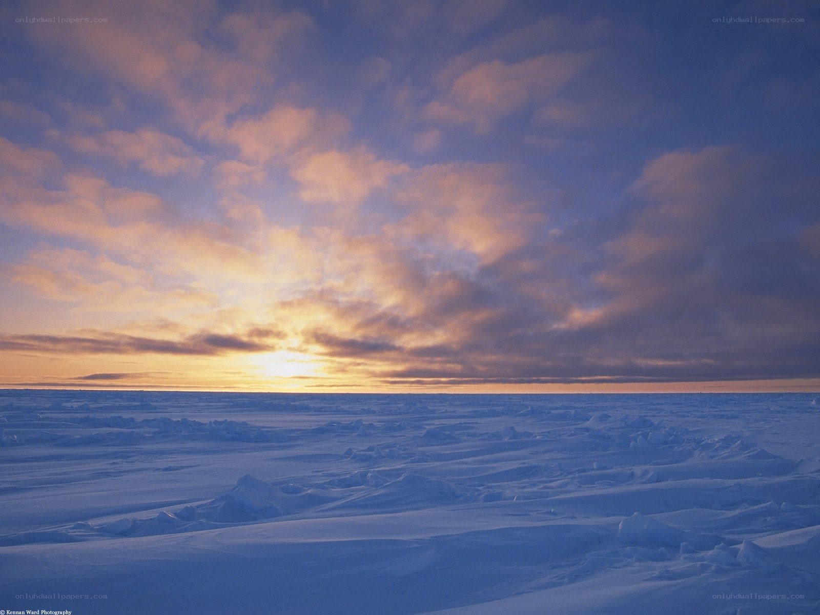 Sunset over frozen tundra