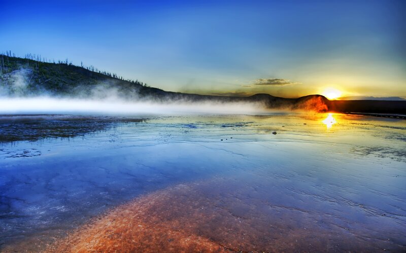 Sunset over geothermal landscape