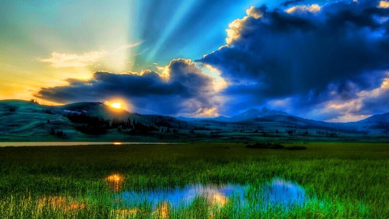 Sunset over Grassy Field — Green, Dramatic, Photograph, Mountains
