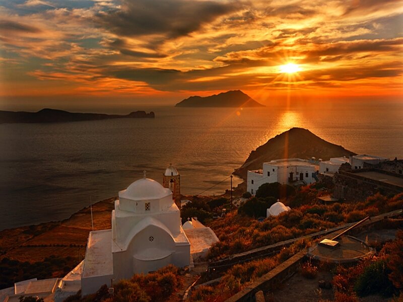 Sunset over Greek island church