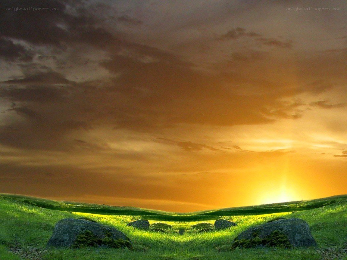 Sunset over green hills