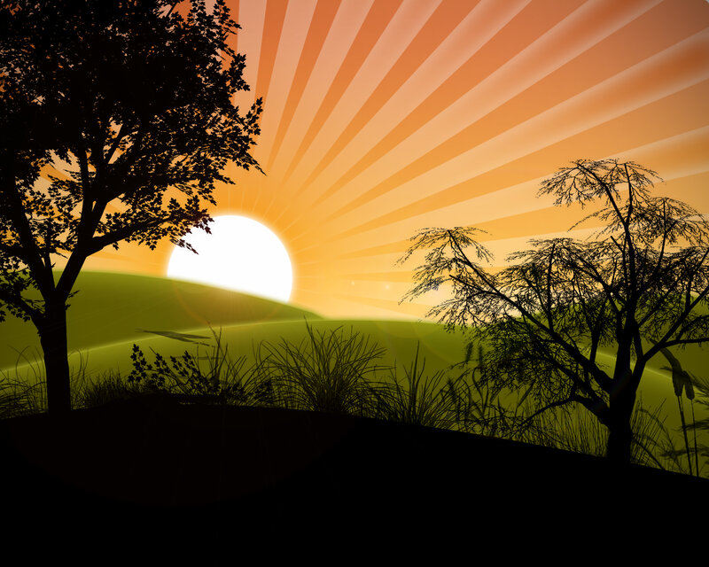 Sunset over green hills