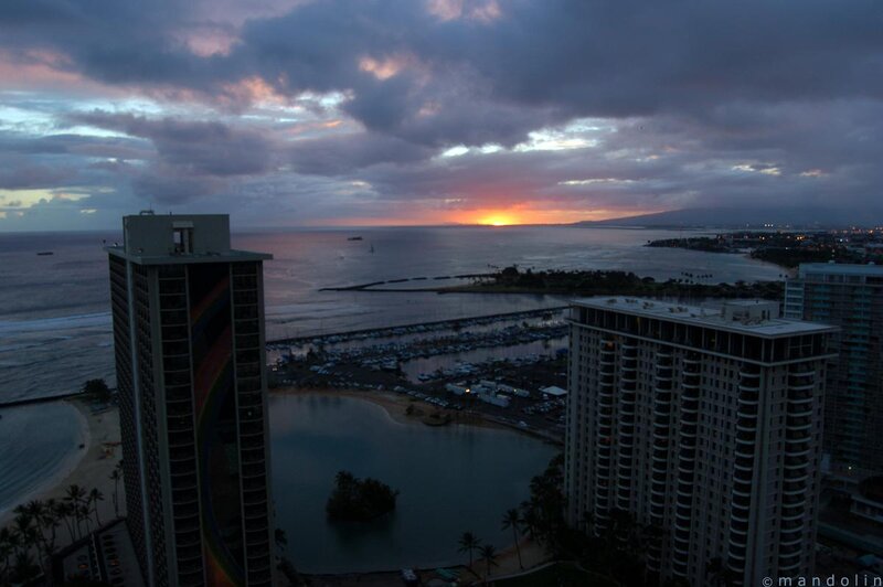 sunset over hawaii cityscape