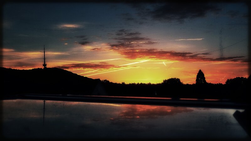Sunset over Hill with Tower — Orange, Dramatic