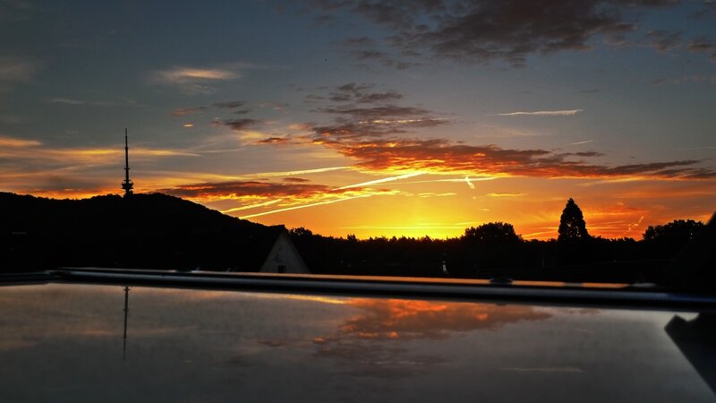 Sunset over Hill with Tower — Orange
