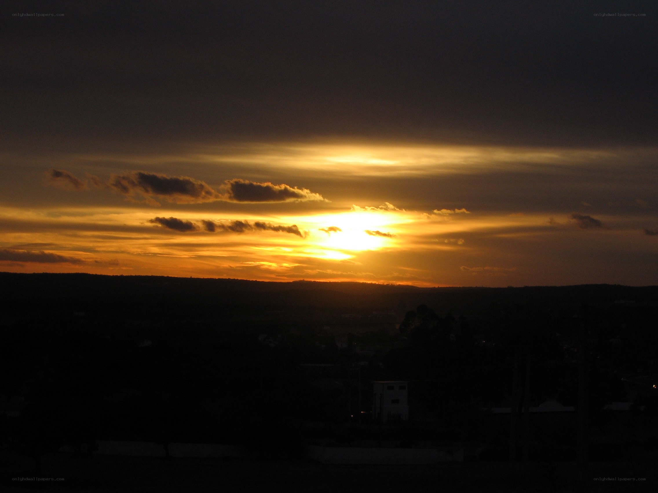 sunset over hills